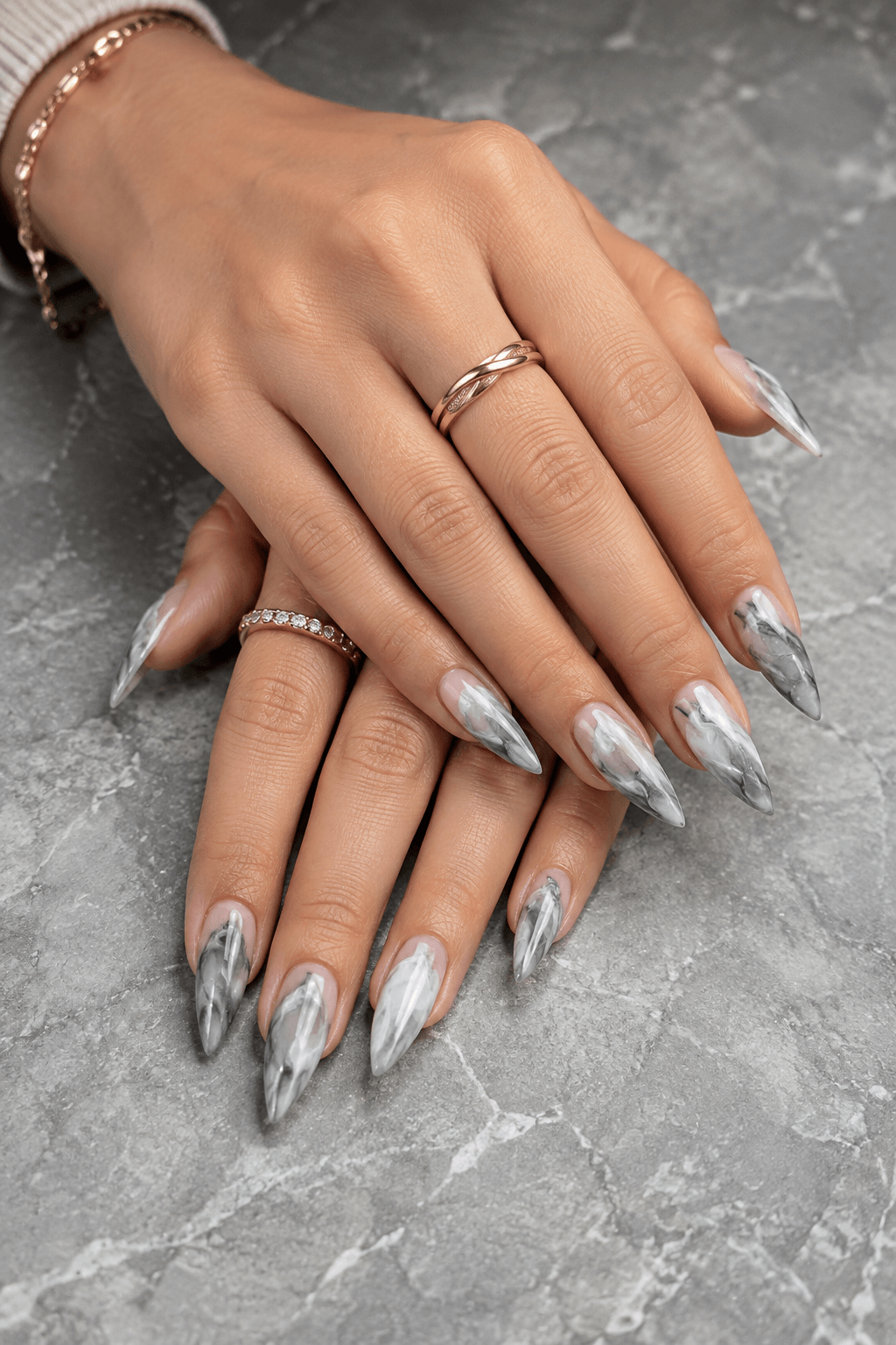 Stiletto Shape Nails with a Marble Swirl Design
