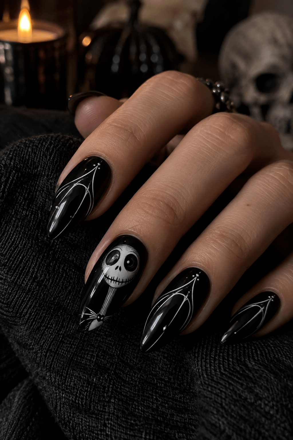 Jack Skellington style Halloween nail art with a skeleton face ack Skellington style Halloween nail art with a skeleton face
