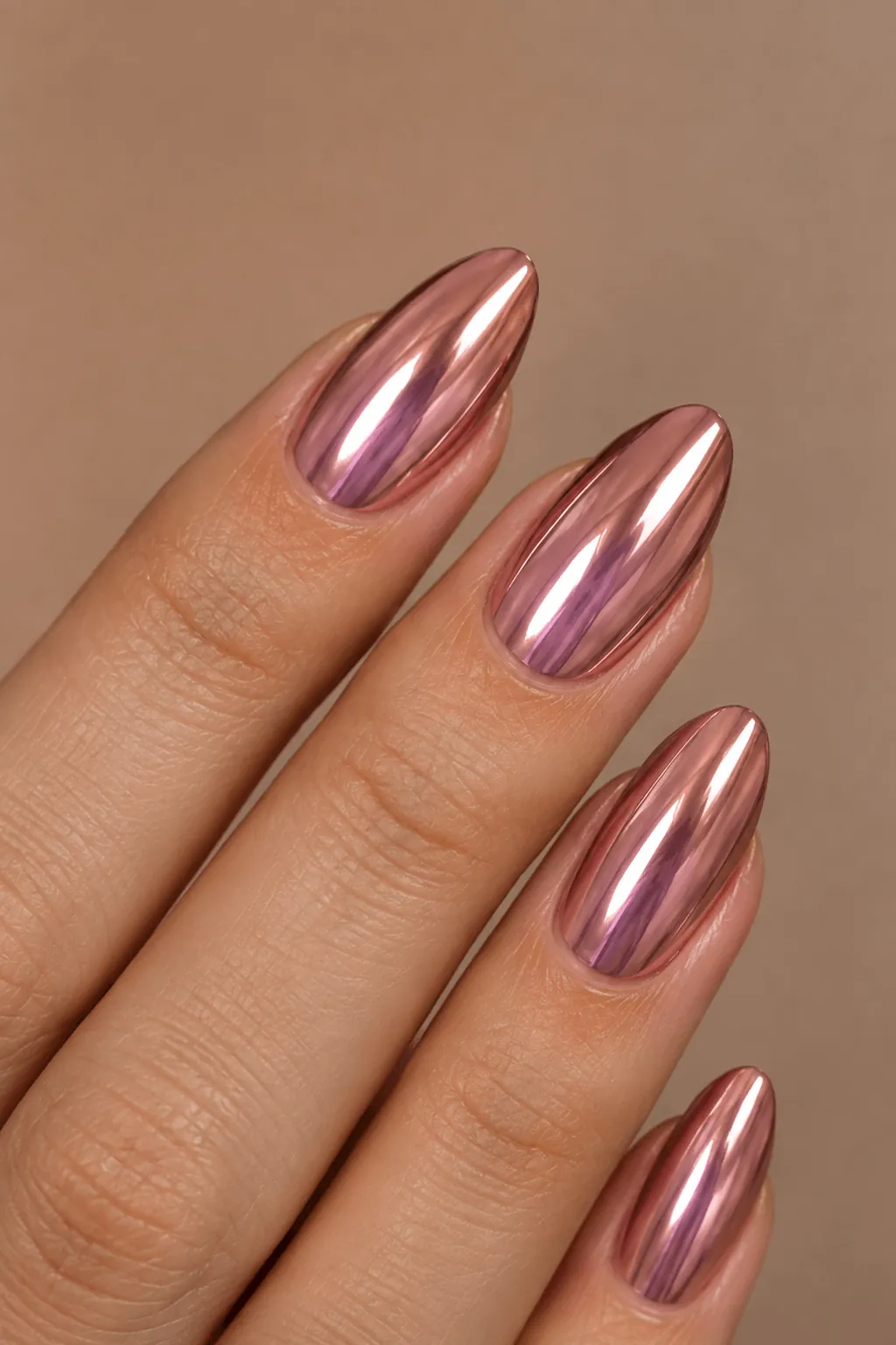 Rose Gold Chrome Nail Ideas Rose gold chrome nails on long almond nails