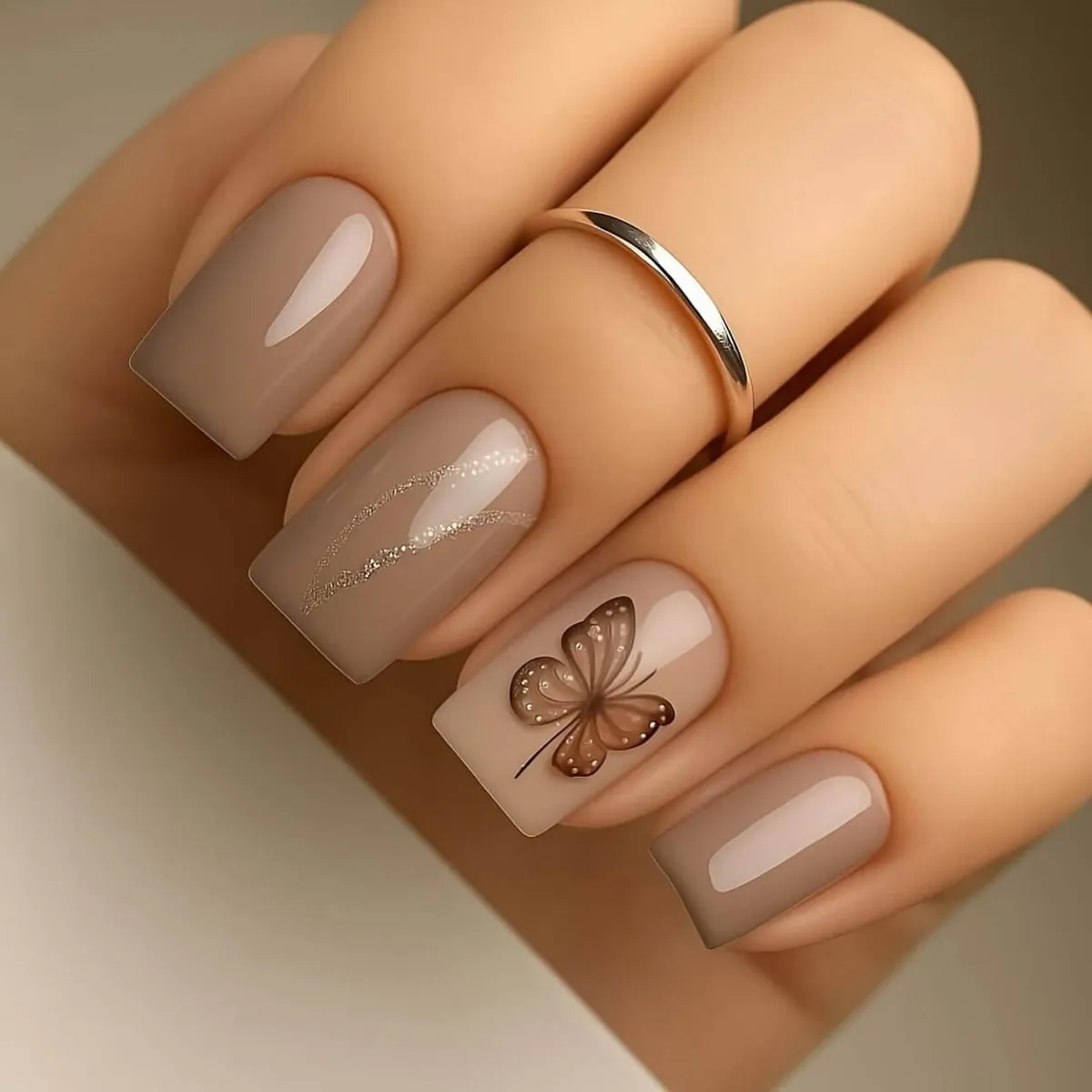 dokhte_lux Nude Nail Art with a Hand-Painted Butterfly Nude Nail Art with a Hand-Painted Butterfly