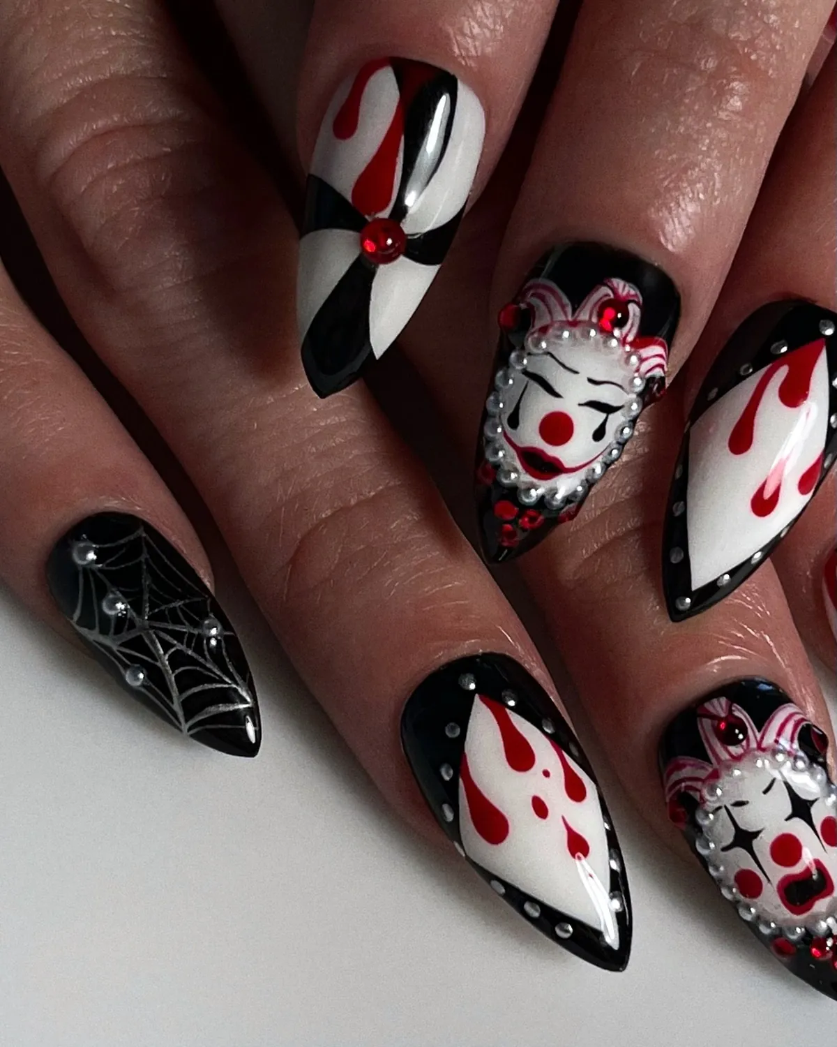 slow.devotion Clown Halloween Nail Art with Blood Drips and Rhinestone Trim Clown Halloween Nail Art with Blood Drips and Rhinestone Trim