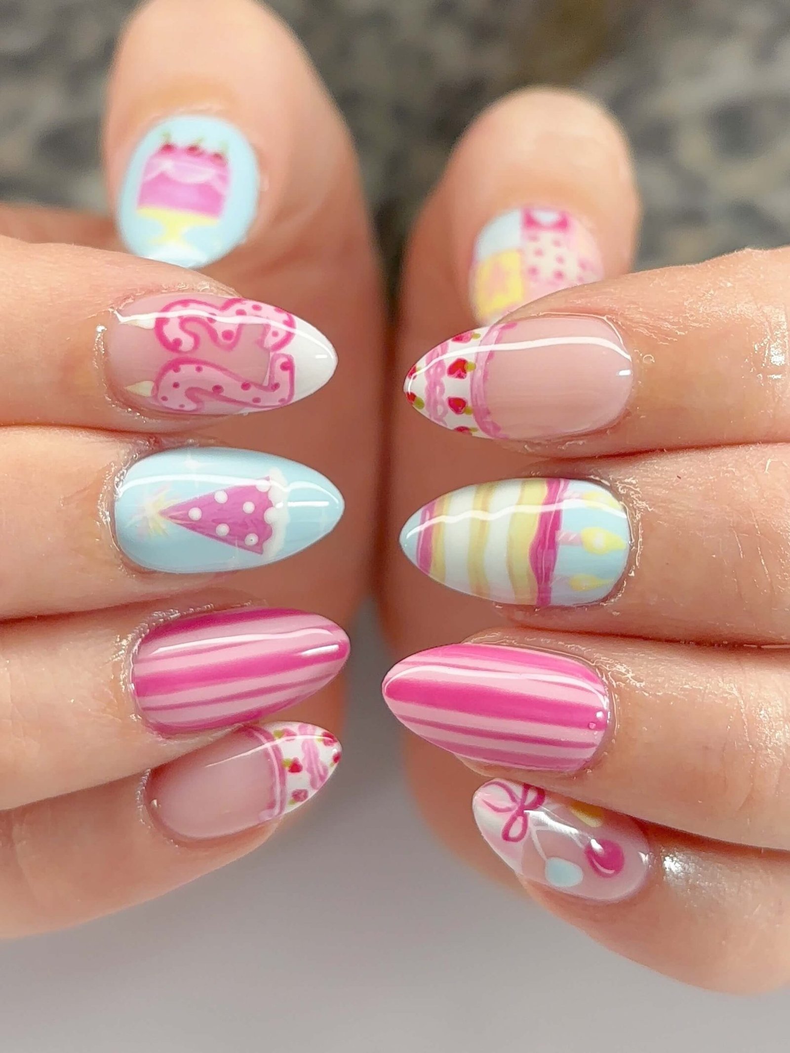 polished_by_paisley Party Hat, Number and Stripes in Pink and Blue : Pink and blue almond nails with a polka dot party hat, a number, and bold stripes